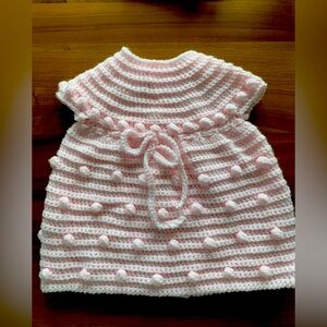 NEW 2 pce outfit for 3-6month old. Hand crocheted ‘bobble’ baby dress & hat.